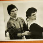 A photo shows Rudolf Nureyev instructing a young Devon Carney.