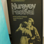 A vintage poster from the Nureyev Festival sits in Devon's office.