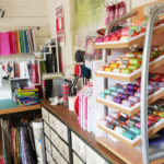 A cabinet full of Aurifil thread in Tula PInk's studio.