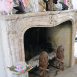 A skull and crossbones fire grate sits in Tula Pink's office.