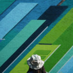 Phil Shafer contemplates his mural in downtown Kansas City.