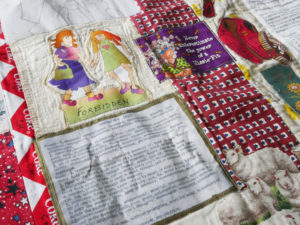 A detail of Nedra's quilt, Brownbackistan, detailing life in Kansas during Sam Brownback's term.