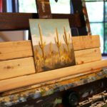 An in-progress desert scene in artist Seth Smith's studio.