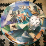 A table decorated with vintage surfing images.