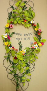 Hope Does Not Die, a paper floral wreath by Grace D. Chin.
