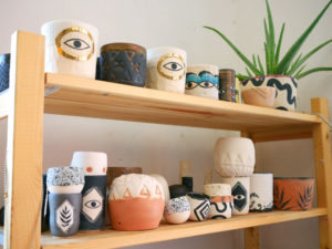 Shelves of Sweet Destructor ceramics.